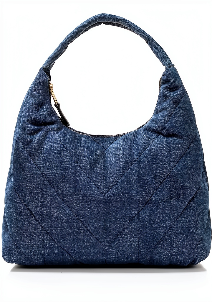 Karl Lagerfeld Hobo Handbag in washed denim displayed on a table