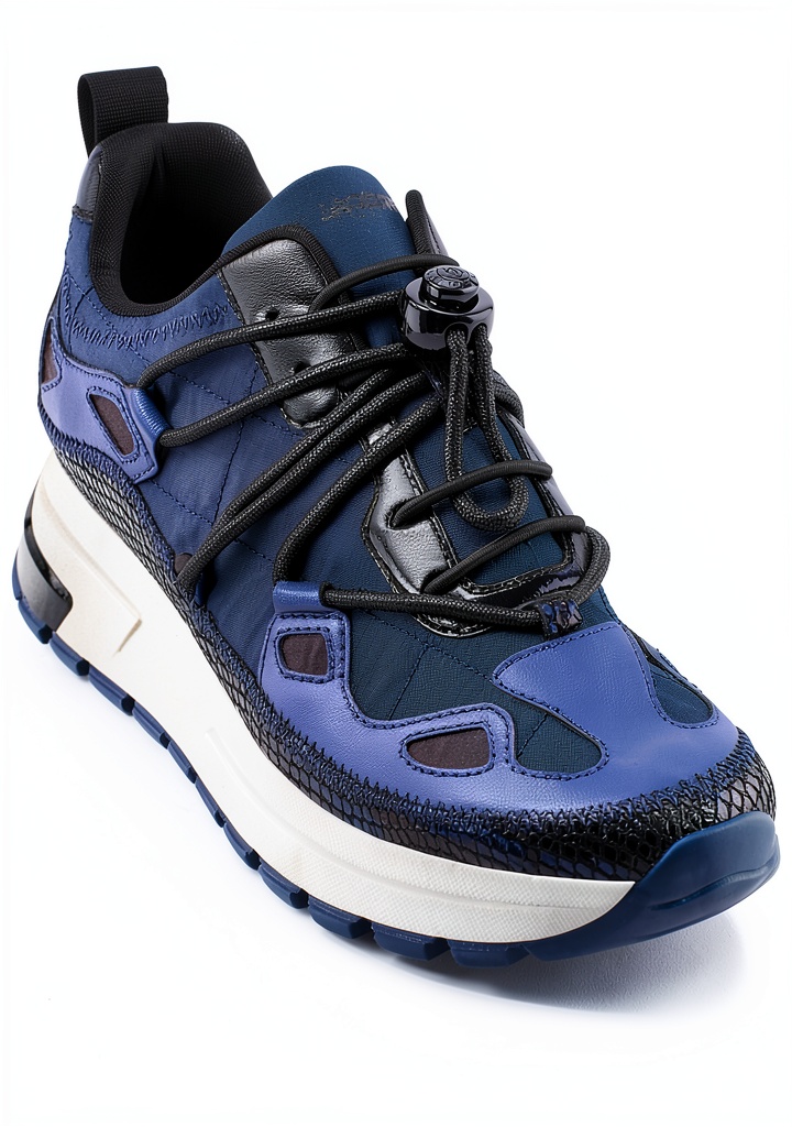 Karl Lagerfeld Paris navy slip-on sneaker on a woman's foot in a casual setting